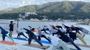 Riverside Yoga Practice by the Ganga in Rishikesh