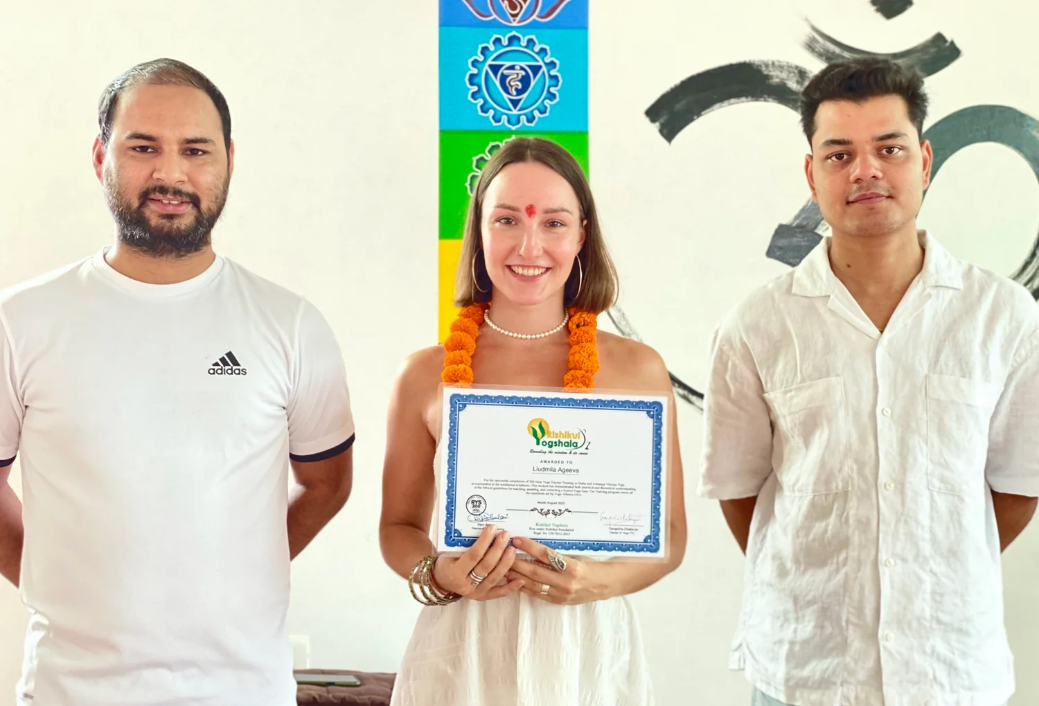 Student receiving Yoga Alliance certificate in Rishikesh