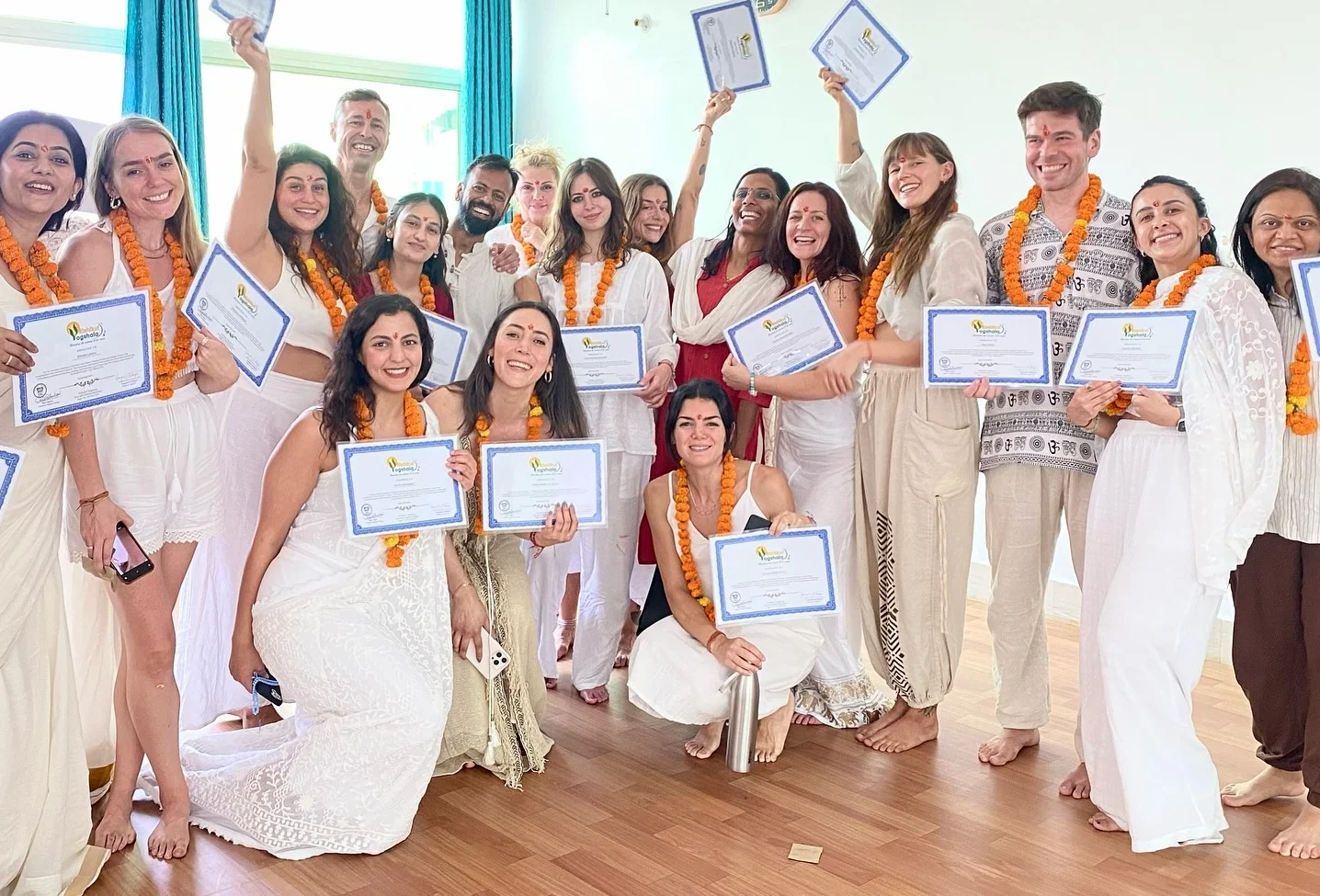 Yoga Students Celebrating Certification at Rishikul Yogshala Rishikesh