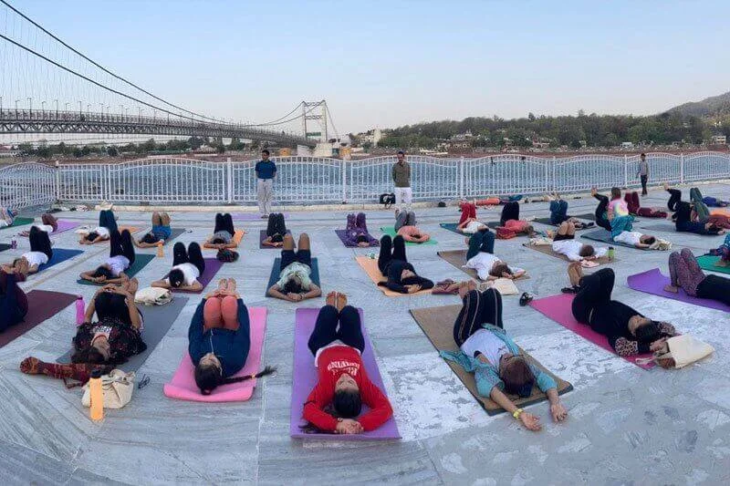 Yoga by the Ganges Riverbank in Rishikesh